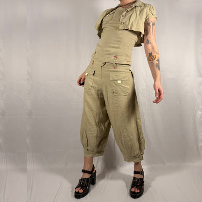 Vintage Y2K Cop Copine 3-piece linen set featuring a cropped button-front jacket, open-back cross-strap top, and pleated balloon-leg cropped trousers with cargo pockets and red contrast stitching.