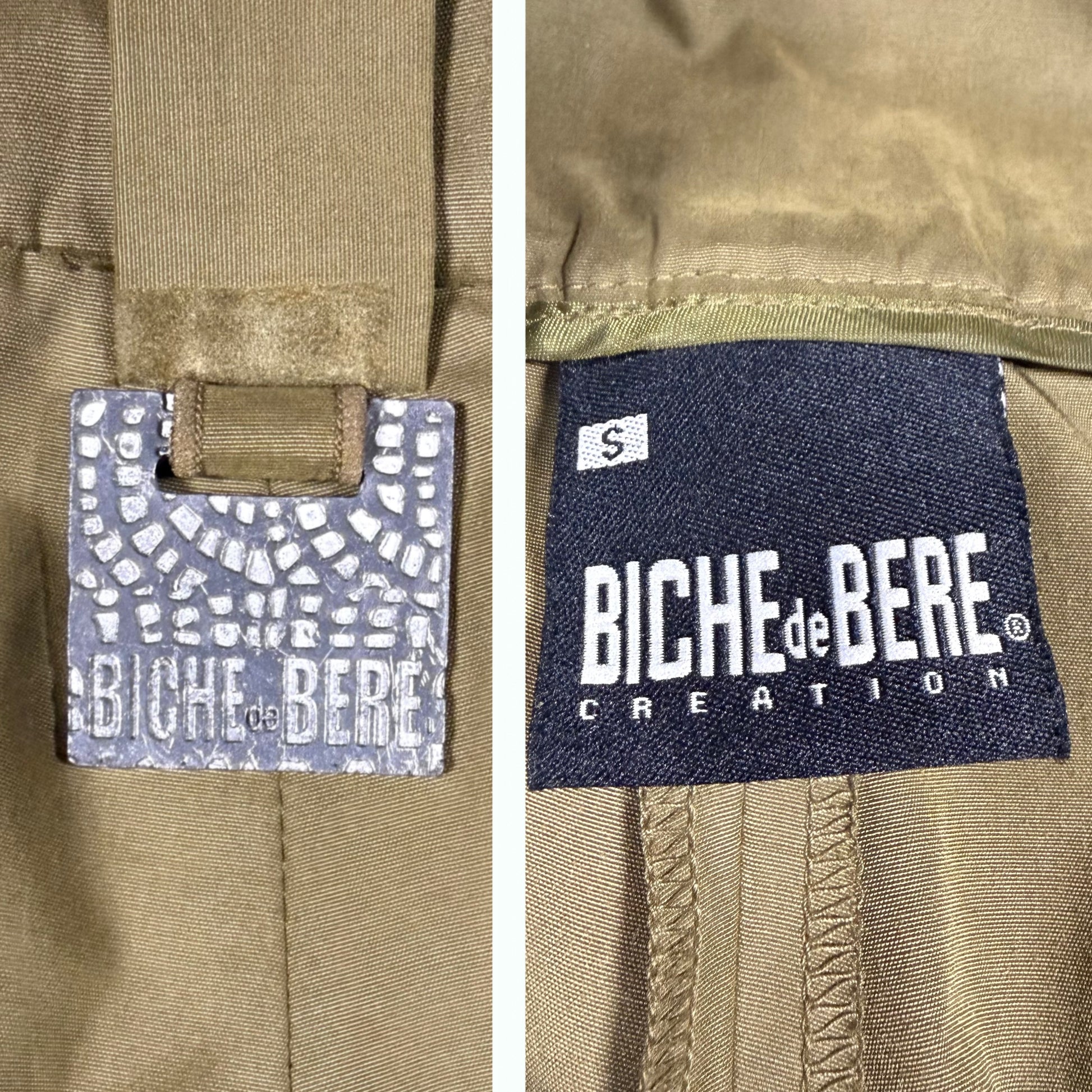 Close-up of a khaki garment showing two brand labels: a mosaic-patterned Biche de Bère tag on the left and a dark blue sewn-in Biche de Bère Creation label on the right.