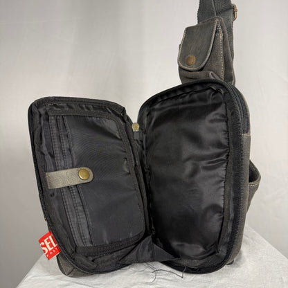 Diesel sling bag fold out interior organizer compartments book style opening