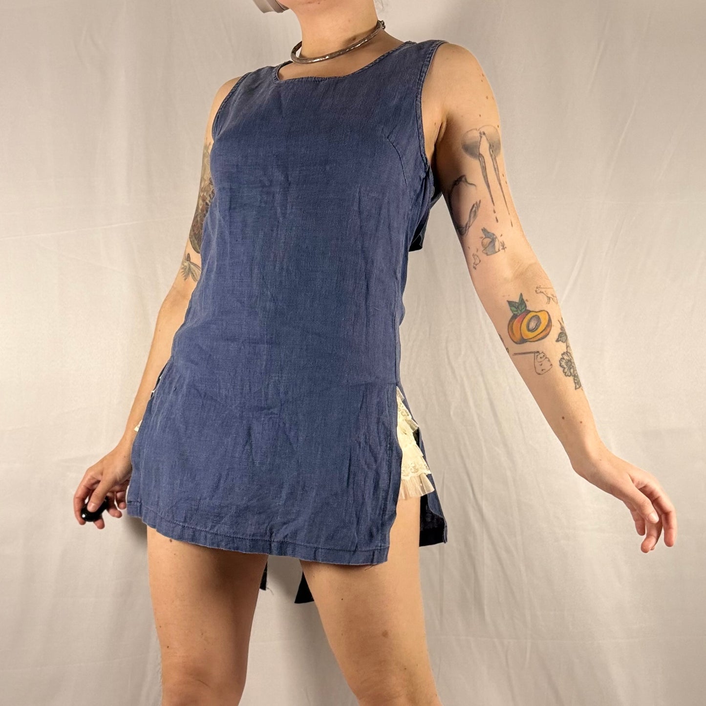 Vintage French made 100% linen tunic top in dusty blue with sleeveless high neck and minimalist longline silhouette.
