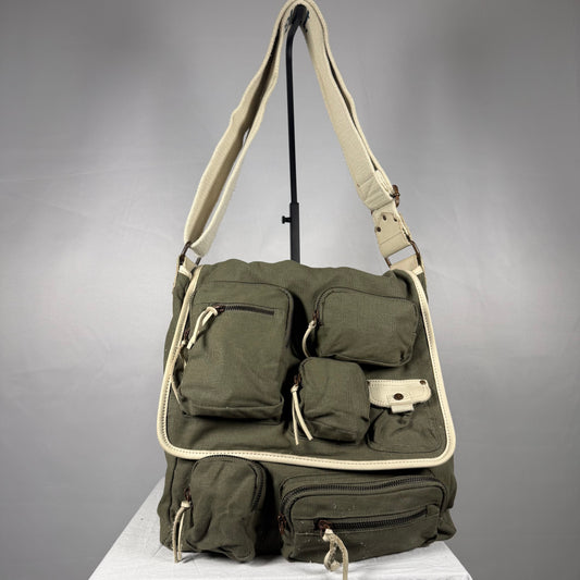 Vintage Y2K Diesel olive linen cargo messenger shoulder bag with cream leather trim, adjustable strap, and multiple utility zip pockets.