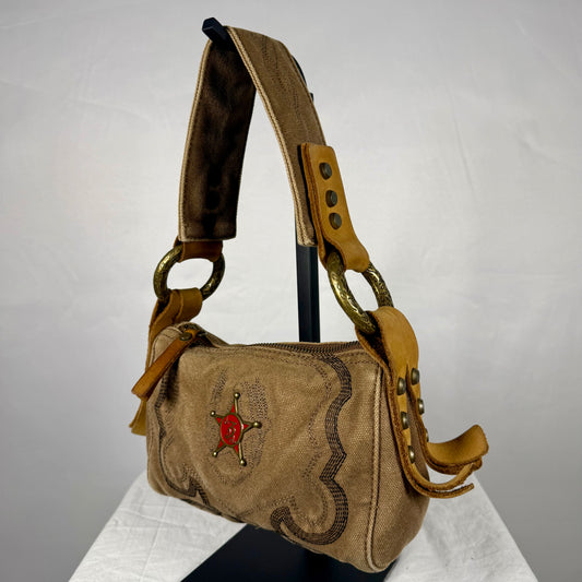 Y2K vintage Diesel mini shoulder bag in embroidered beige canvas with leather trim, western details, studded strap, metal O-rings and star emblem.